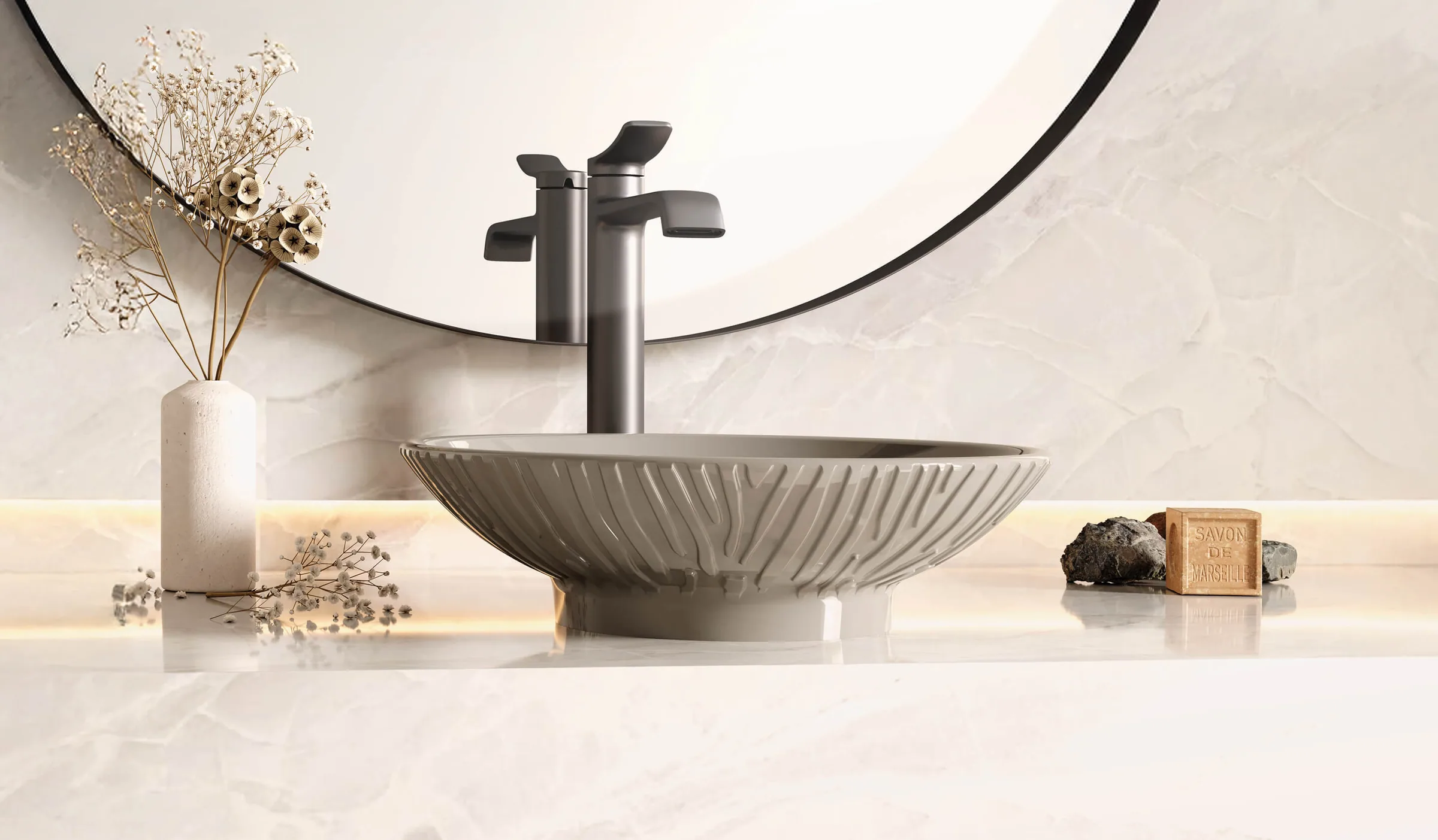 Creavit Savior fluted top-counter washbasin on a stone counter beneath a round mirror