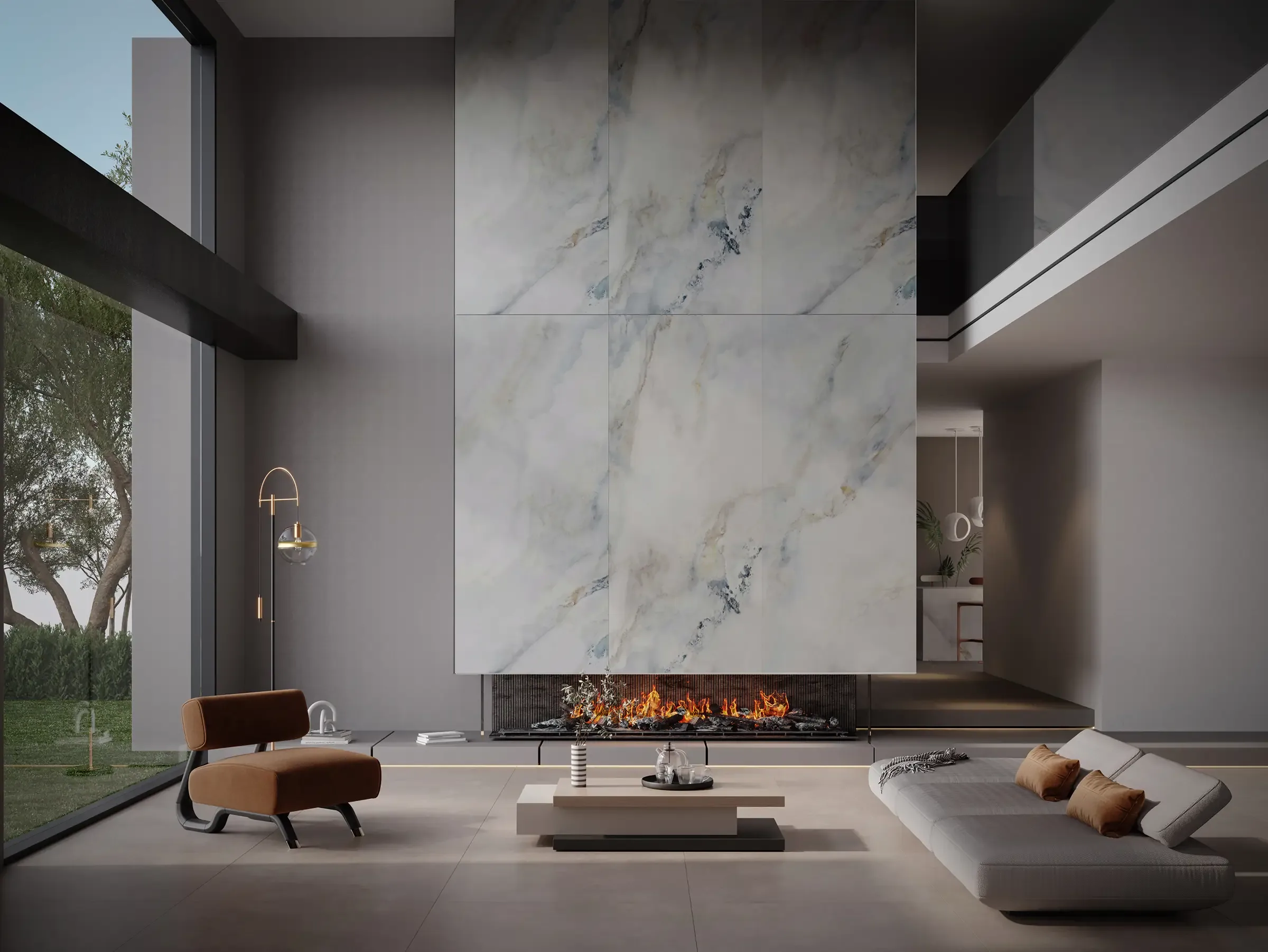 Double-height living room with an NG Kütahya Sky Onyx feature wall above a fireplace