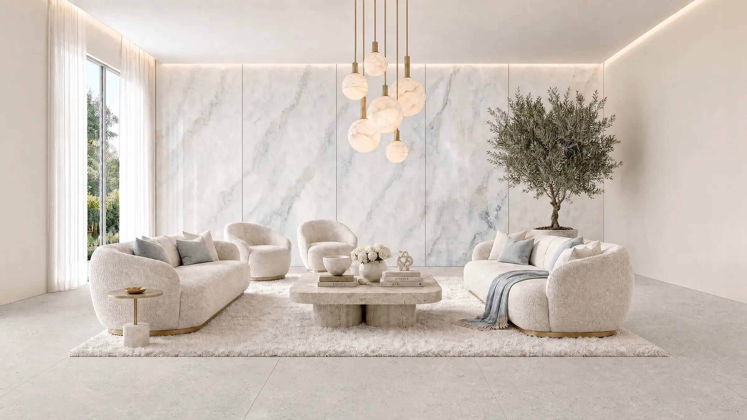 Bright living room with an NG Kütahya Sky Onyx wall behind ivory sofas